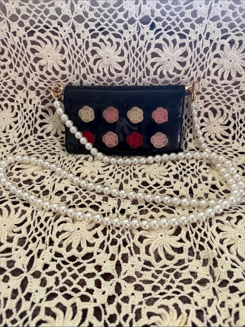 CHANEL Black Patent Leather Wallet with Multicolor Camellia Appliqués
